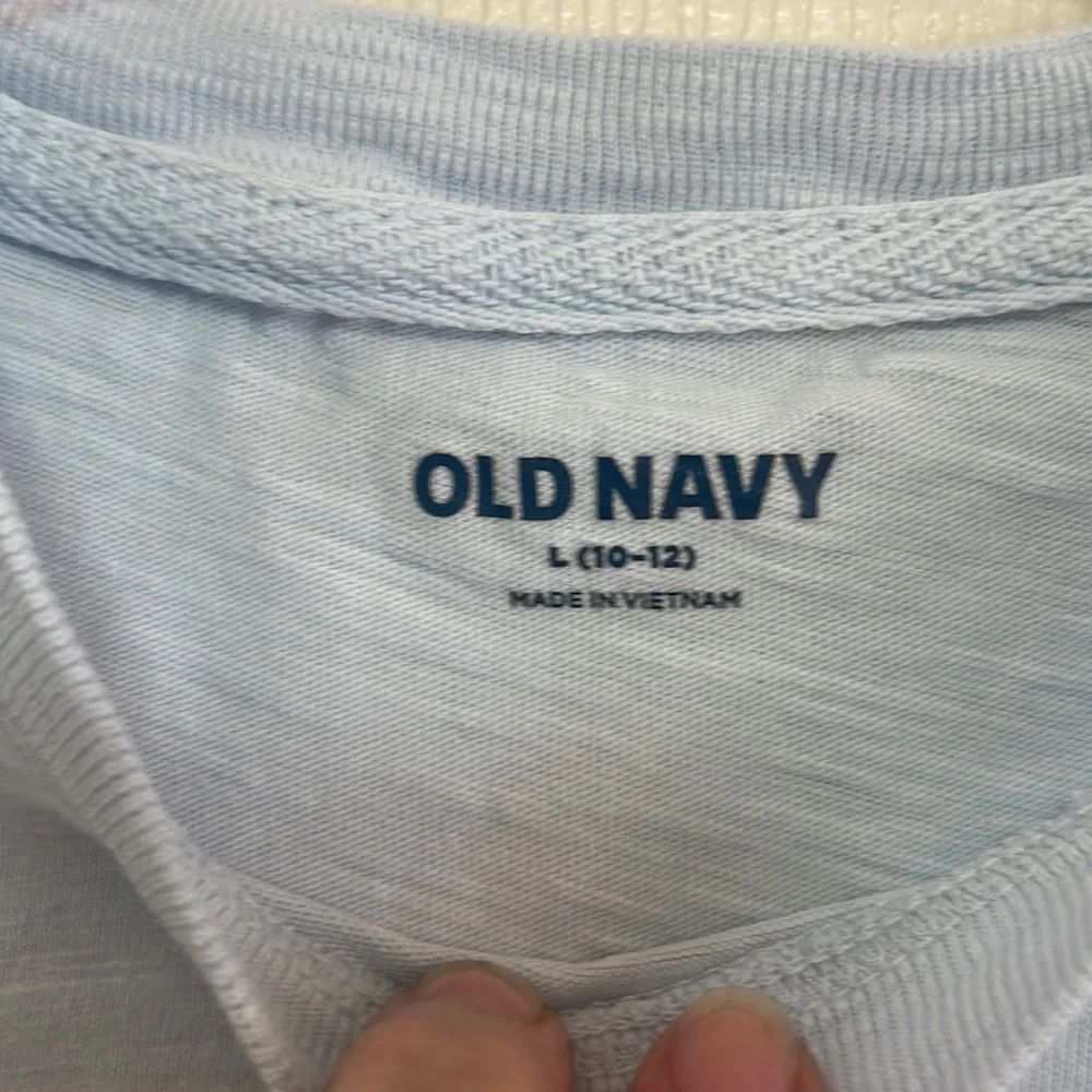 Old Navy baby blue size 10 - 12 short sleeve tee. Great condition!